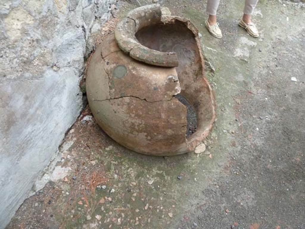 Ins. IV.17, Herculaneum, September 2015. Looking east along north side of bar-room, where there was a hearth and a buried dolium, in which some walnuts were discovered.